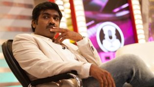 கவண் photo